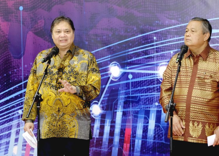 Gubernur Bank Indonesia, Perry Warjiyo dan Menteri Koordinator Bidang Perekonomian, Airlangga Hartarto saat pembukaan FEKDI secara virtual, Senin.